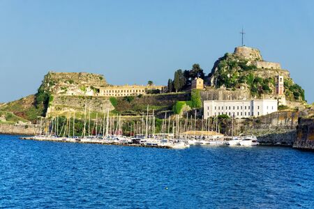 Old fortress with boats in Corfu Town (Kerkyra), Corfu Greeceの写真素材