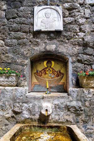 Old water source on street in Kotor Town, Montenegroの写真素材
