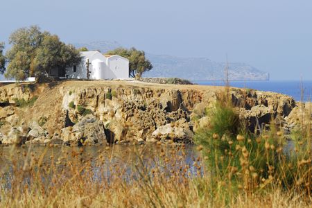 chapel on a peninsula in Agoi Apostoloi near Chania, Creteの写真素材
