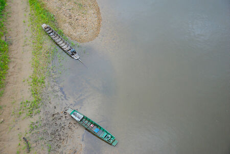 Fishing boats on riverの写真素材