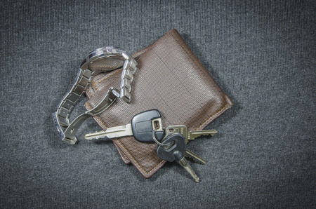 Wallets and car key of wristwatchの写真素材