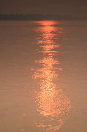 Sunrise reflection of riverの写真素材