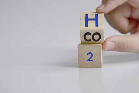 Change to fuel cell vehicles. Hand flips a dice and changes the expression CO2 to H2