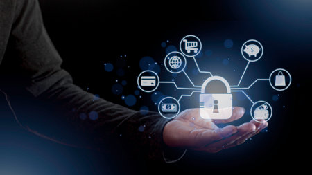 cyber security internet and networking concept. Businessman hand working with VR screen padlock icon on computer backgroundの写真素材