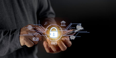 Businessman holding light icon social security network connection with shield guard to protected from cyber attacks. Network security system conceptの写真素材