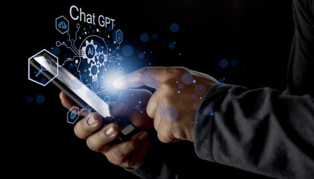 Businessman holding light icon GPT intelligence Ai.Chat GPT Chat with AI Artificial Intelligence, chat generate. Futuristic technology, robot in online system.の写真素材