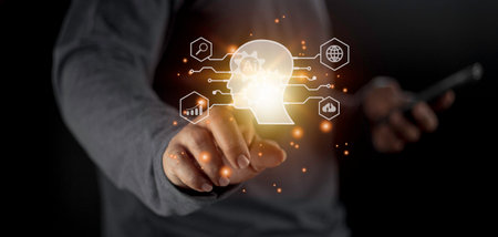 Businessman using light bulbs icon intelligence Ai. Chat bot with AI Artificial Intelligence, Futuristic technology, robot in online system.の写真素材