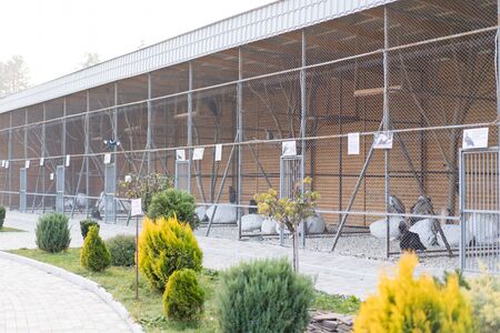 Cages with various birds at the zoo.Cages with various birds at the zooの写真素材