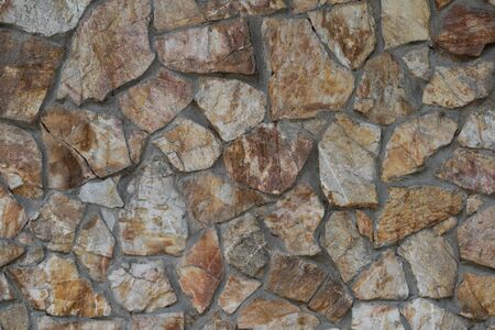 Stone wall as background and texture.Stone wall as background and textureの写真素材