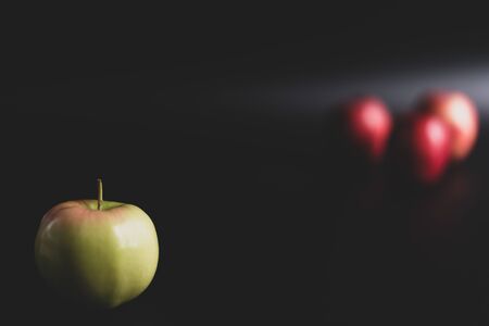Red apples on a black background.Red apples on a black backgroundの写真素材
