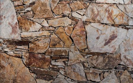 Wall of stone as texture and background.Wall of stone as texture and background