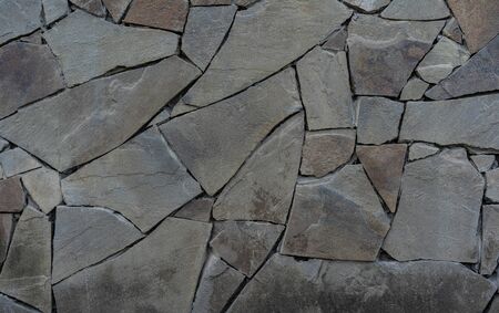 Wall of stone as texture and background.Wall of stone as texture and background