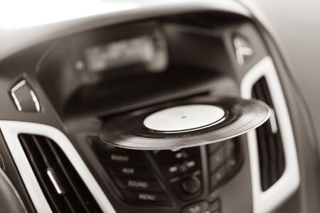 Antique Record is located in the dvd port of the car.Antique Record is located in the dvd port of the carの写真素材