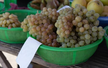 White grapes on the counter for sale.White grapes on the counter for sale.の写真素材