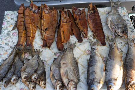 Stockfish dried on a counter for sale.Stockfish dried on a counter for sale
