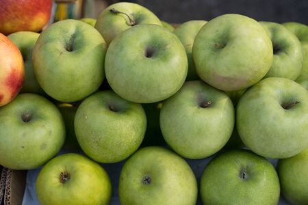 Apples on the counter for sale.Apples on the counter for sale