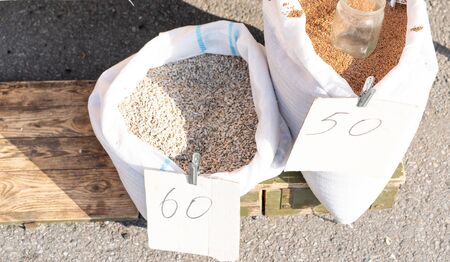 Flax seeds on the counter for sale.Flax seeds on the counter for saleの写真素材
