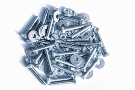 Bolts and screws on a white background.Bolts and screws on a white backgroundの写真素材