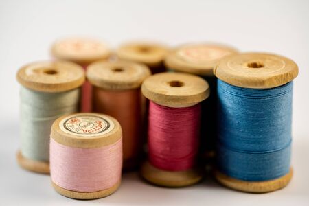 Spools of thread on a white background.Spools of thread on a white backgroundの写真素材