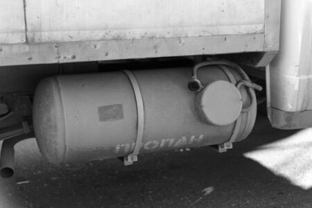 Propane gas cylinder mounted on the carの写真素材
