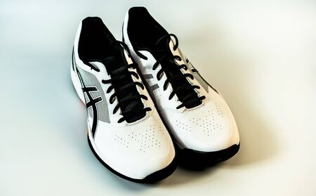 White tennis sneakers on a white background