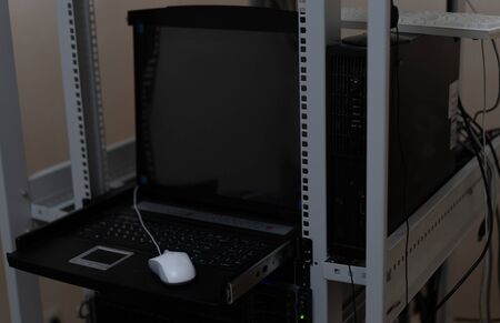 Server management console installed in the server cabinet