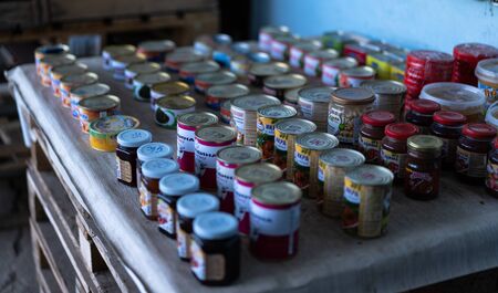 Canned food on the counter for sale.の写真素材