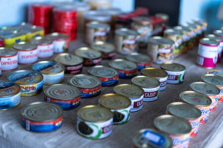 Canned food on the counter for sale.の写真素材