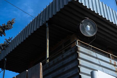 Spotlight mounted on the towerの写真素材