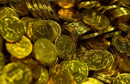Candy in the form of coins in a box