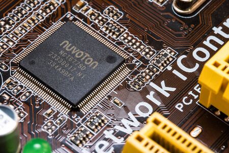 A microcircuit motherboard with chips. Macro photography