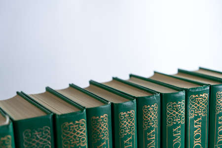 Books in a row on a white background