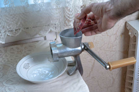 Manual meat grinder is ready for work