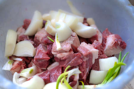 Pieces of meat and vegetables for cooking minced meat