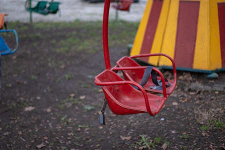 Old swing in the parkの写真素材