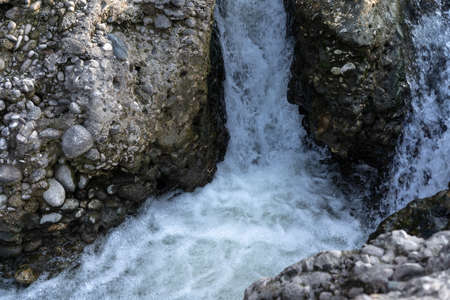 The pressure of the water of a mountain river