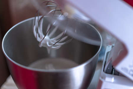 Pressing the mixer cover open buttonの写真素材
