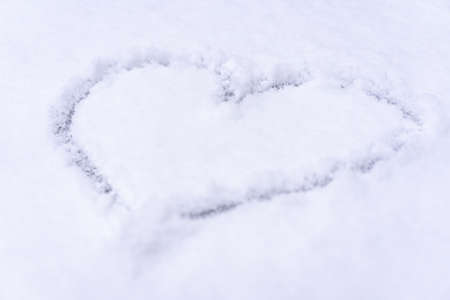 The image of the heart in the snow