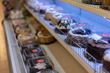 Cakes on a storefront for sale