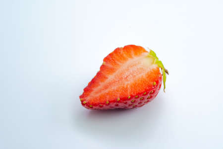 Ripe strawberries on a white backgroundの写真素材