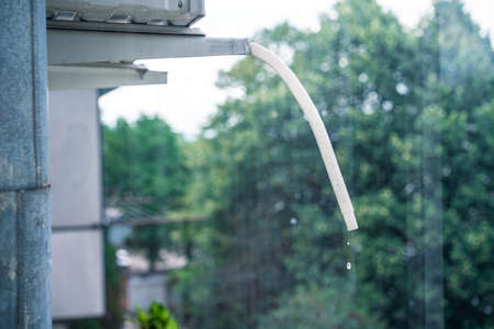 Air conditioner operation. Water condensateの写真素材