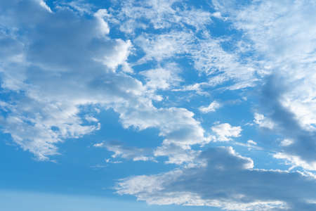 Blue sky with many cloudsの写真素材