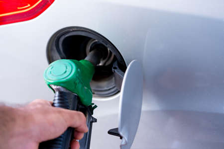 Refueling the car with gasolineの写真素材