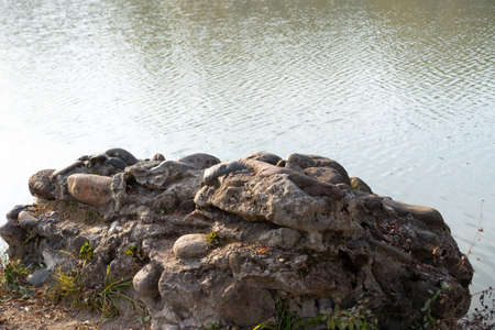 Huge stone near the lakeの写真素材