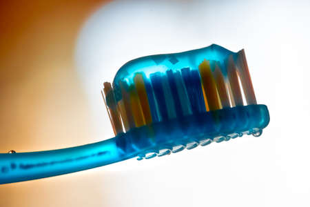 Toothpaste on a brush, for cleaning teethの写真素材