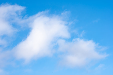Blue sky with white clouds on itの写真素材