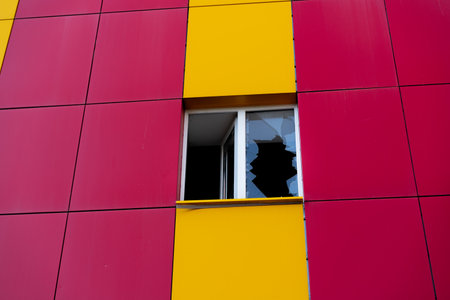 Broken window in the building. As backgroundの写真素材