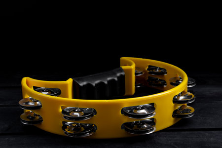 Musical instrument tambourine, on wooden backgroundの写真素材
