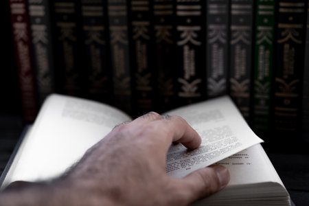 Open book on the background of booksの写真素材
