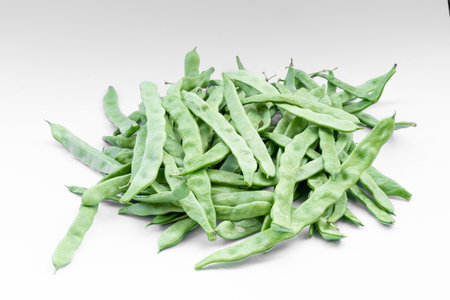 Fresh bean pods on white backgroundの写真素材